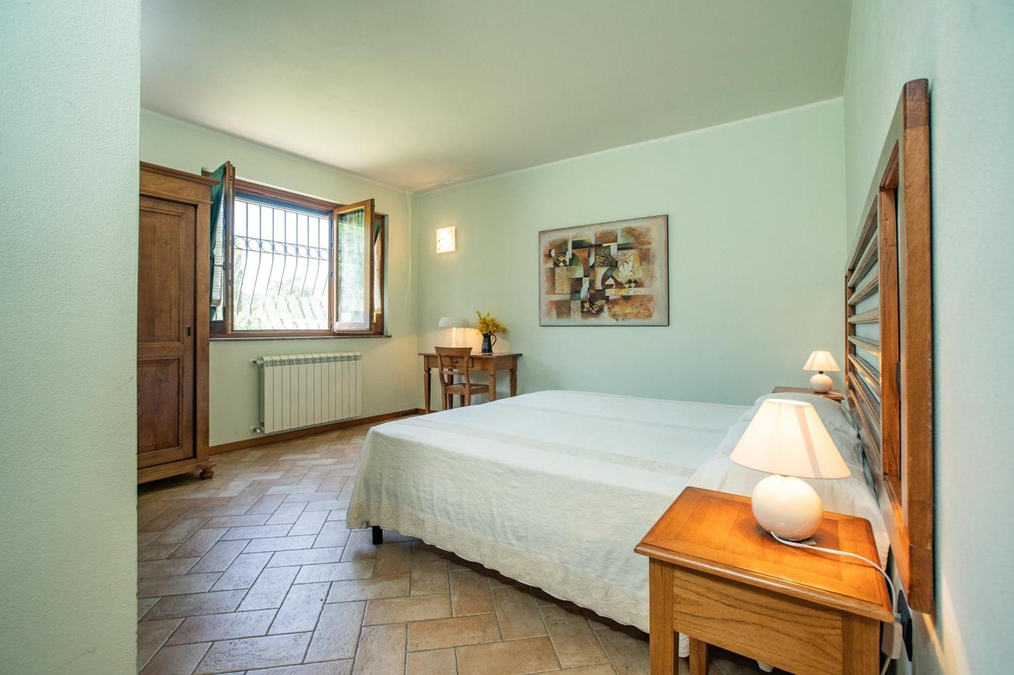 Cerqua Rosara Residence Valtopina Szoba fotó